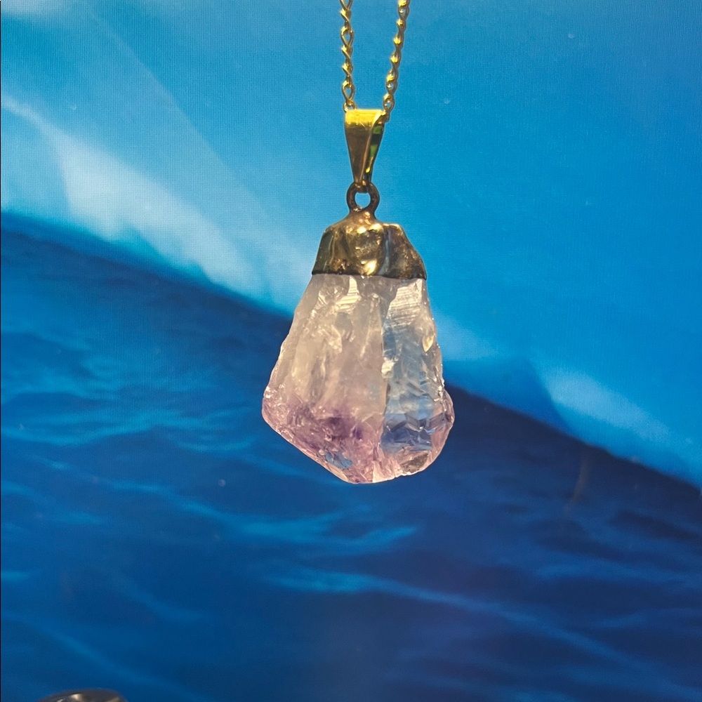 Elegant Organic Amethyst Crystal Pendant Necklace on a 19” gold filled chain.